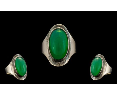 Jade Statement Ring hallmarked silver.  Statement ring with large cabochon jadeite stone to centre, ring size P/Q. Please see