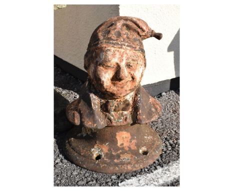 Unusual late 19th Century cast iron figural capstan modelled as a gentleman in bow-tie, jacket and nightcap, possibly Wee Wil