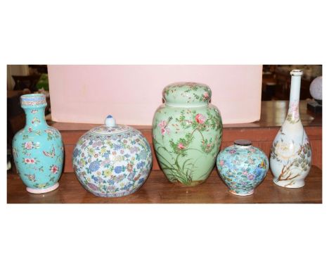 Five Oriental ceramic jars and covers, vases, ranging from 12.5cm high to 29cm high  