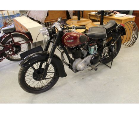 A 1952 Ariel Model VH motorcycle, maroon and black, Frame No. SD 2518, 775 miles, sold together with an extract copy from the
