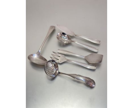A four-piece continental white metal set including butter knife, sugar sifter, cake lift and fork, an Epns serving spoon and 