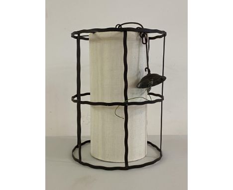 An Arts and Crafts style wrought metal lantern four branch light fitting of cylindrical form, H53cm