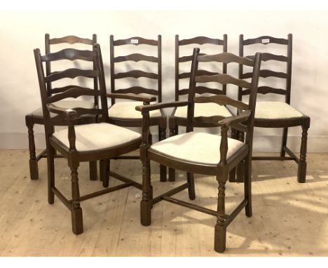 A Set of six (4+2) stained beech dining chairs, with ladder backs and drop in upholstered seat pads, H94cm