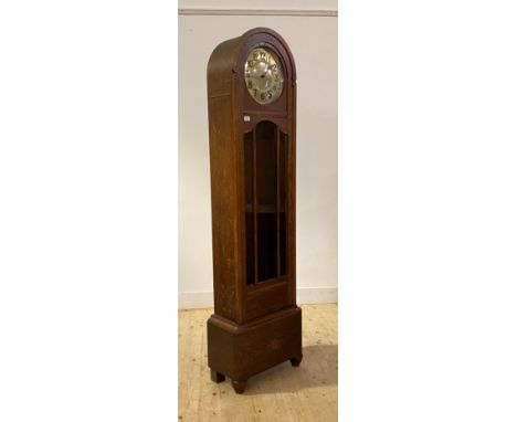 A 1930's oak cased Westminster chiming longcase clock, with gilt dial and Arabic chapter ring, complete with three weights an