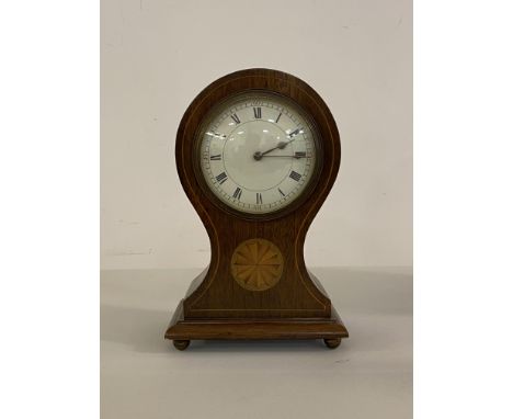 An Edwardian inlaid mahogany balloon time piece clock, with white enamel dial painted with Roman chapter ring, single train m