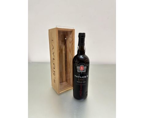 A Taylor's bottle of "First Estate Reserve" port complete with presentation pine box