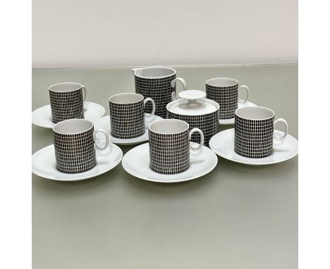 A German Thomas porcelain 14-piece coffee set, in the mid-century style, with grey lattice design, complete with sugar basin,