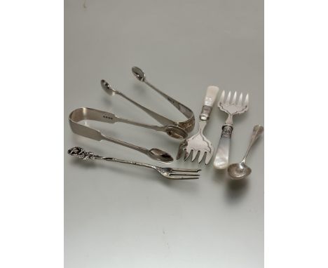 A pair of Epns mother of pearl handled pickle forks, Sheffield silver pair of sugar tongs, continental white metal pickle for