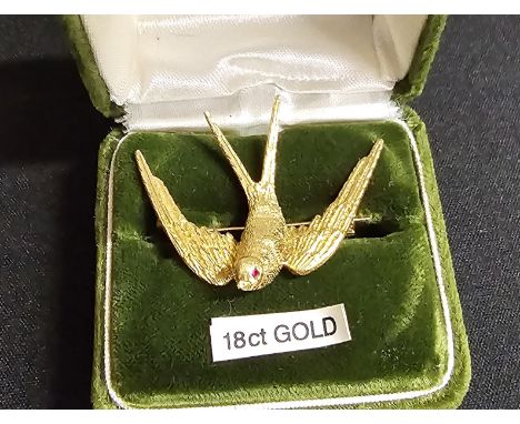 18 CARAT GOLD STONE SET SWALLOW BROOCH, WEIGHT APPROX 8.5 GRAMS