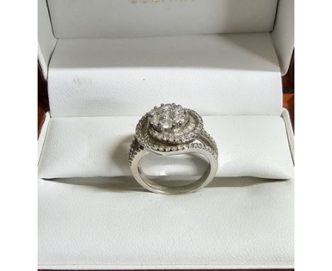 10 CARAT WHITE GOLD DIAMOND SET  LADIES RING, WEIGHT 5.8 GRAMS, WITH CERTIFICATE FROM THE JEWELLERY COUNCIL OF SOUTH AFRICA