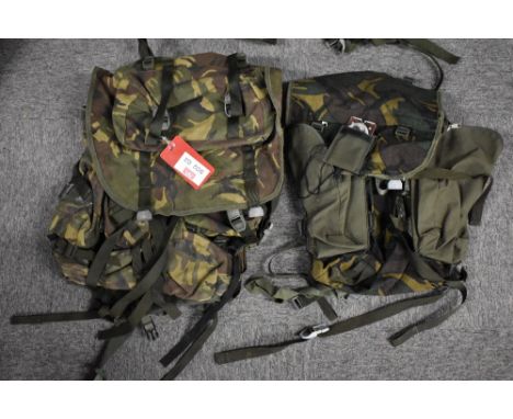 Royal Artillery uniform jacket with buttons and badges, trousers with braces, unworn ankle dms boots size 7, puttees, various