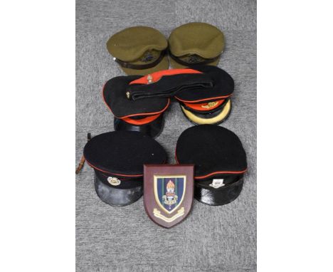 Uniform caps comprising Royal Artillery, including one slouch-hat with bullion badge, Royal Engineers and University of Sheff