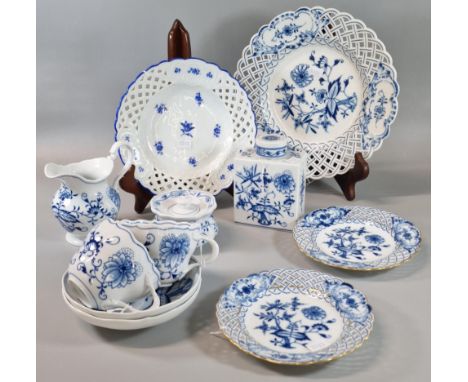 Collection of Meissen porcelain to include: 'Blue Onion' design tea caddy and cover, cups and saucers, cream jug, sucrier and