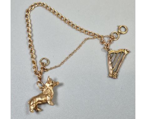 9ct gold curb-link charm bracelet, the two charms to include: harp and Corgi dog. 11.7g approx. (B.P. 21% + VAT)