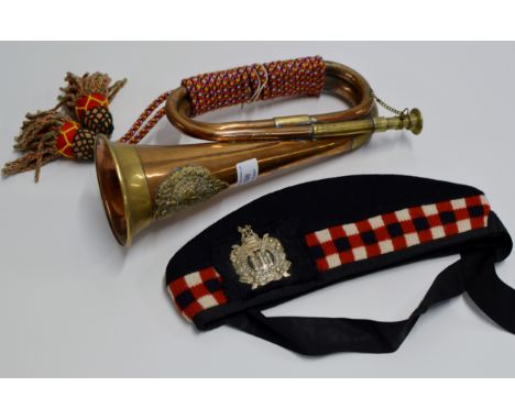AN OLD COPPER & BRASS MILITARY BUGLE WITH ARGYLL & SUTHERLAND REGIMENTAL BADGE, TOGETHER WITH A KOSB (KINGS OWN SCOTTISH BORD