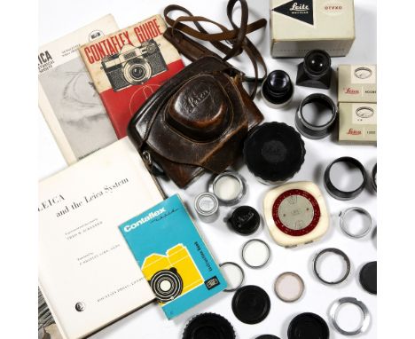 Leica (Germany) Camera accessories, mid-20th Century Including colour and UV filters, lens hoods, mount adaptors, focus finde