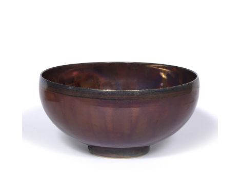 Sutton Taylor (British 1943) Large ceramic bowl deep red and black lustre glaze moulded potter's mark to bottom rim 26cm acro