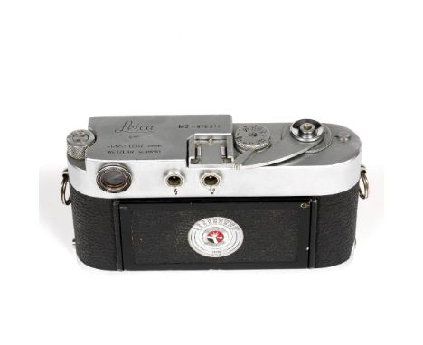 Leica (Germany) M2 rangefinder camera body, c1960 with original retail box, body cap and instruction manual   Chrome, serial 