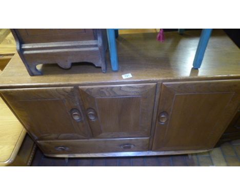 ERCOL SIDEBOARD. Ercol light sideboard with two cupboards and one drawer