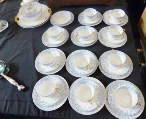 D &amp; G FRANCE TEA SERVICE. D &amp; G, France, part tea service in blue and gilt design on white ground, thirty nine pieces