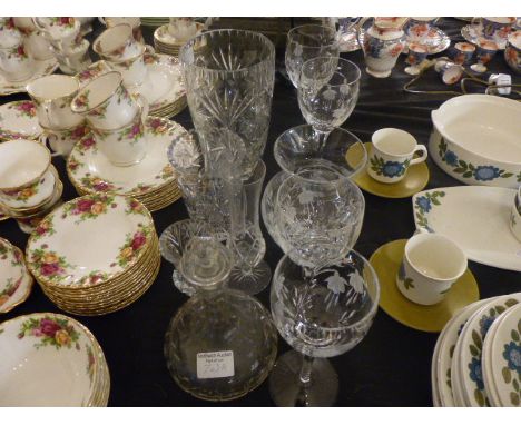 QUANTITY OF GLASSWARE. Quantity of etched and cut glassware including vase and decanter