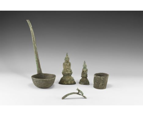 19th century AD. A mixed bronze group comprising: two core-formed Buddha figurines; a ladle with figure of a dog to the handl