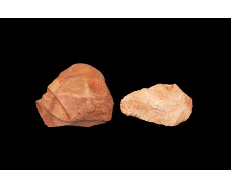 Acheulian, 1.76 million-10,000 years BP. A pair of chert hand-tools from Cyrenaica, Libya, the larger marked with the findspo