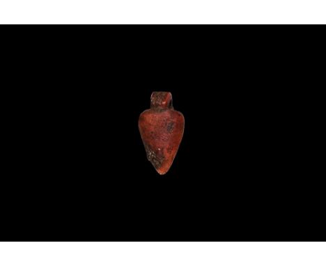 New Kingdom, 1550-1070 BC. A hardstone amuletic pendant of a heart with ribbed suspension loop. Cf. Andrews, C. Amulets of An