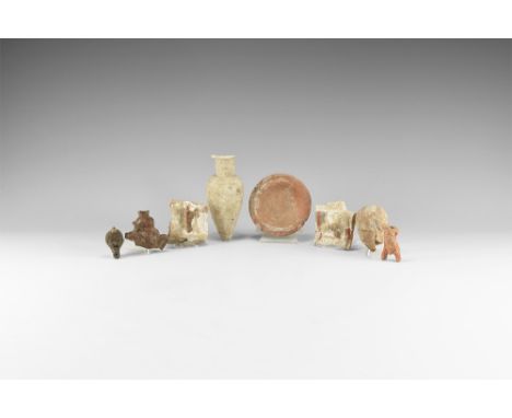 5th-3rd century BC. A mixed group of ceramic fragments comprising: a miniature amphora; two painted vessel shoulder panels; a