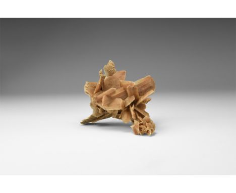 A 'desert rose' consisting of a number of bladed selenite gypsum crystals, several with 'hourglass' sand inclusions. See Bone