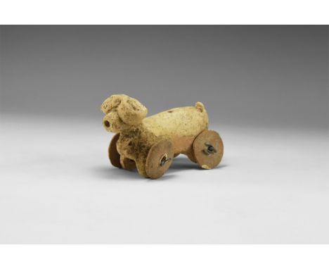 2nd millennium BC. A ceramic hollow-formed bull figurine with holes to the rump, back and muzzle, pierced lug to the chest, e