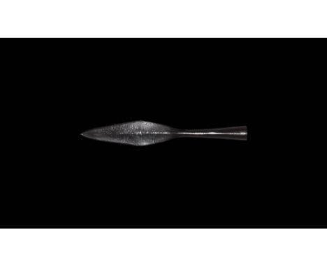 1st century BC-2nd century AD. A lentoid-section lozengiform iron blade with sturdy neck, expanding closed socket with single