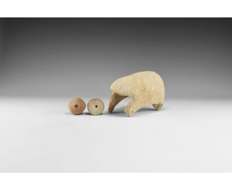 2nd millennium BC. A mixed group comprising: a cover for a model cart with enclosed rear and rounded canopy; a biconvex wheel