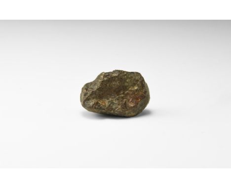 A brown meteorite from an unidentified locality, probably an L-chondrite, based on its relatively light weight and ablation c