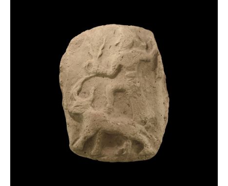 19th-17th century BC. A rectangular baked clay plaque with low-relief figure of god Adad wearing long skirt and belt(?) stand