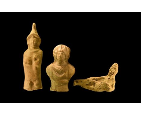 3rd-1st century BC. A mixed group of ceramic figurines comprising: a reclining female banqueter with piled hairstyle, holding