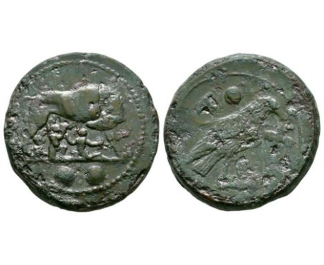 217-215 BC. Obv: she-wolf standing right, suckling the twins Romulus and Remus, two dots below. Rev: eagle standing right, fl