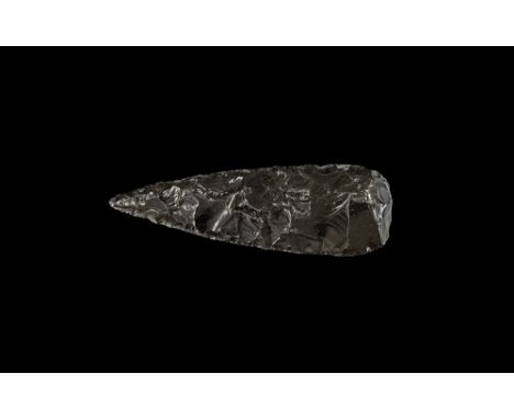 6th-15th century AD. A finely made biconvex obsidian leaf-shaped lancehead with two cutting edges, flat butt.  59 grams, 12cm