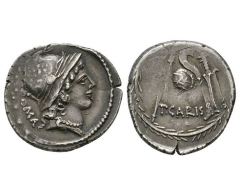 46 BC. Obv: ROMA behind helmeted and draped bust of Roma right. Rev: cornucopia on globe between sceptre and rudder; T CARISI