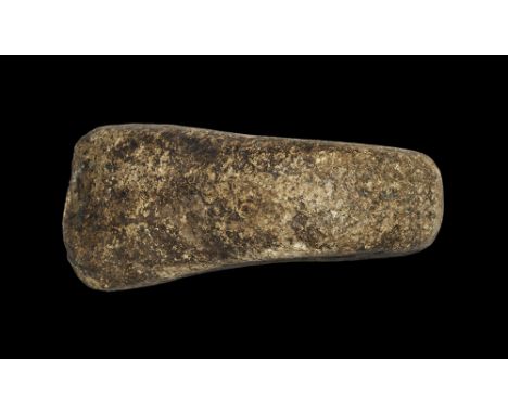 Neolithic, 5th-2nd millennium BC. A pecked and ground boat-shaped axe-hammer with convex cutting edge; edge and hammer butt s