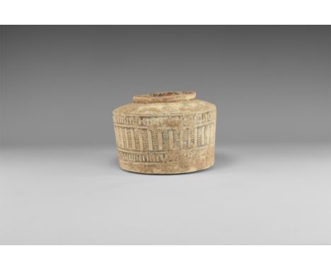 3rd millennium BC. A ceramic flat bottomed jar with sharp edge shoulders and low rim, decorated in brown pigment with geometr