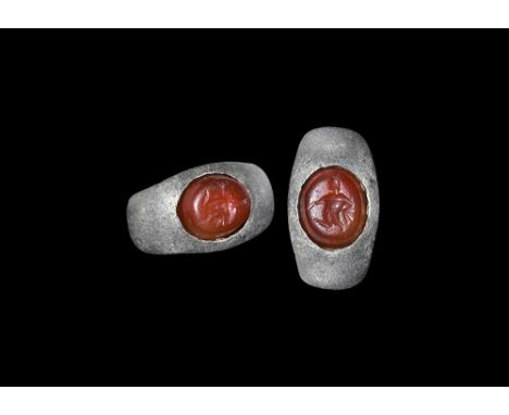2nd-3rd century AD. A D-section hoop with flared shoulders, inset carnelian with intaglio of a Harpy. Cf. Ruseva-Slokoska, L.