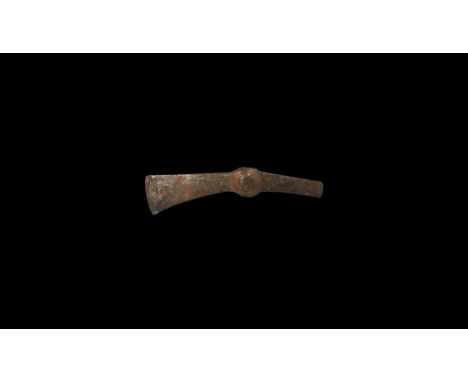 9th-11th century AD. An iron axehead with wings to the socket and long hammer to the rear.  373 grams, 20.5cm (8"). From an o