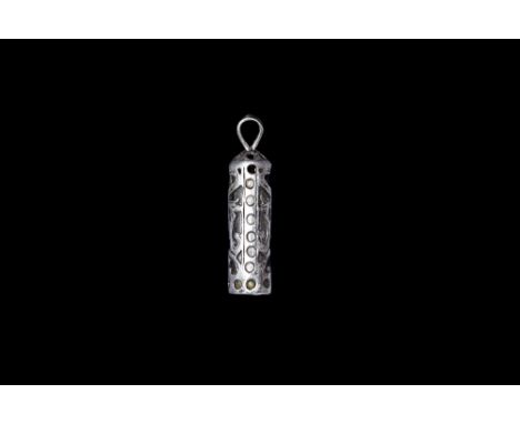 18th-19th century AD. A silver tubular pendant with openwork foliage, manuscript prayer rolled within.  3.37 grams, 32mm (1 1