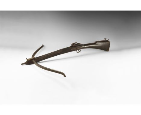 Circa 1800 AD. A 'stone bow' or bullet-shooting crossbow by J. Johnson of Manchester with rifle-type wooden stock, iron trigg