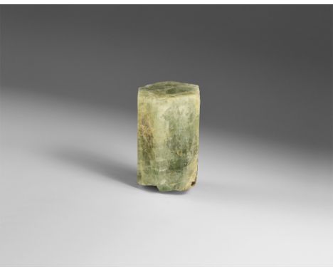 A fine crystal of green aquamarine with transparent areas, flat, lustrous faces, and a pinacoidal termination, in old white c