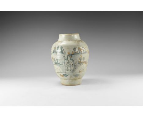 Qing Dynasty, 1616-1911 AD. A tin-glazed ceramic jar with carination to the body, steep shoulder and neck; blue decoration in