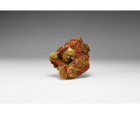 A group of spherical aggregates of yellow-green adamite in a limonite matrix. See Bonewitz, Dr. Ronald Louis, Rocks & Mineral