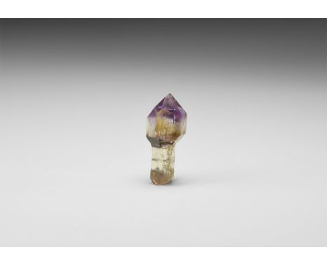 A superb amethyst 'sceptre' crystal, the finely-formed amethyst resting on a quartz crystal, in white card tray with Gregory,