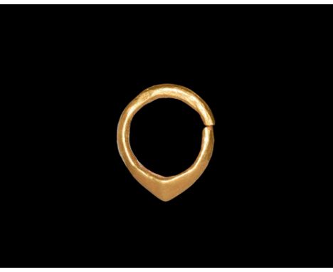 8th century BC. A hollow-formed D-section earring with conical lower edge. Cf. Marshall, F.H. Catalogue of the Jewellery, Gre